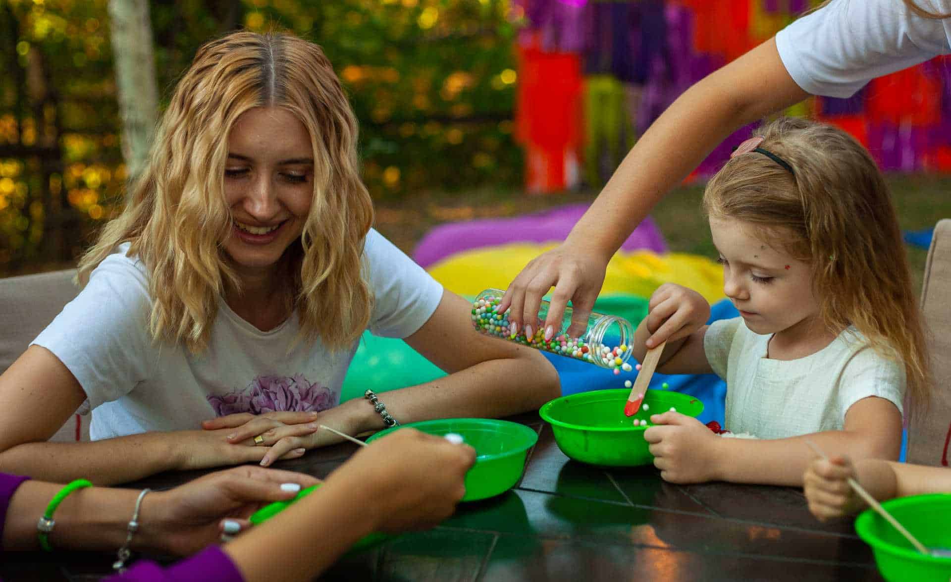Colorful outdoor therapy session with children enhancing social skills and emotional development.