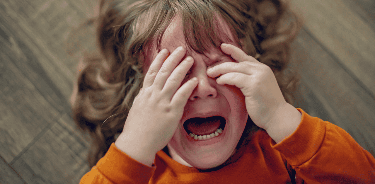 Child crying and upset, emotional distress, behavioral issues.