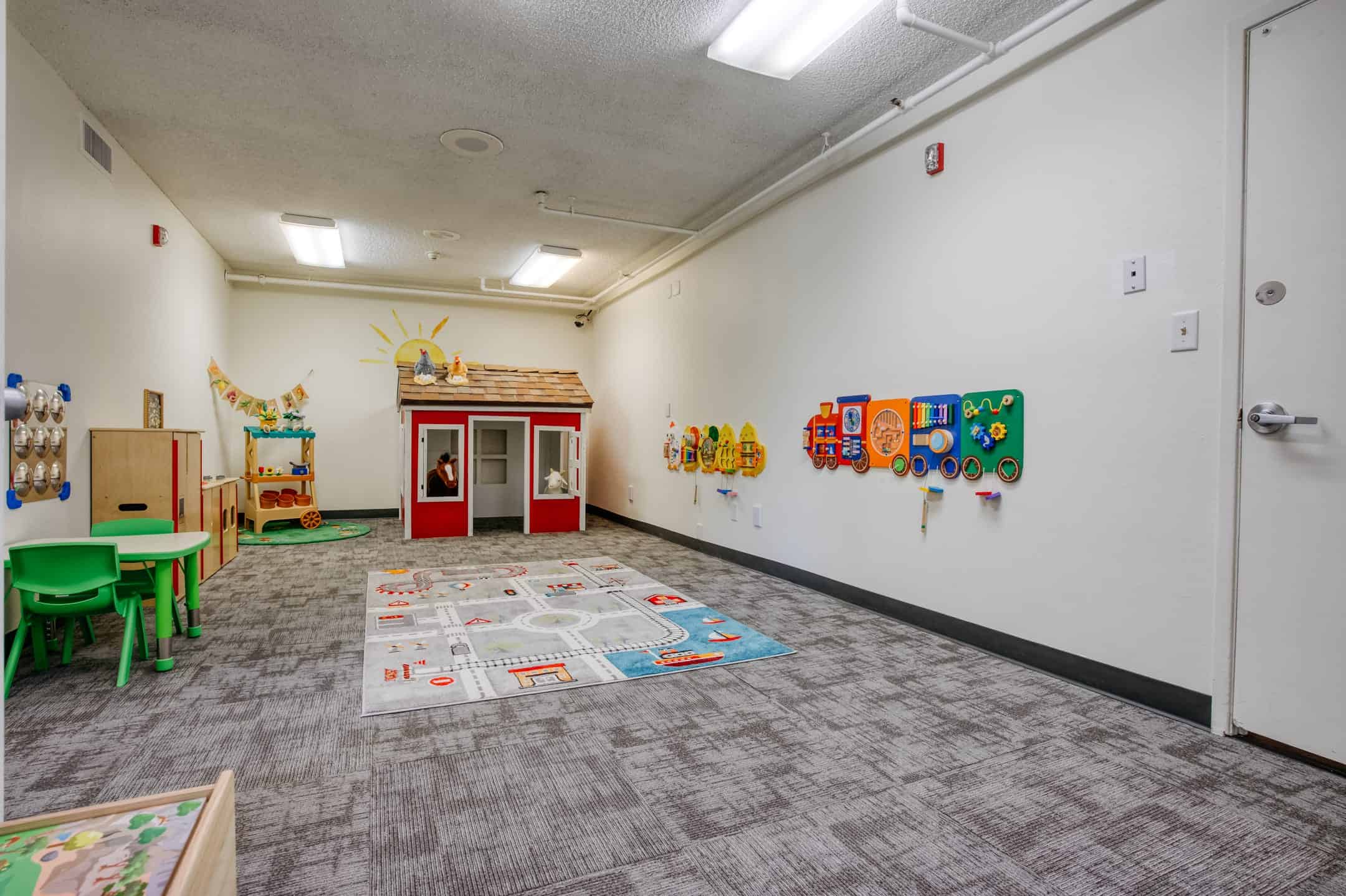 Bright and engaging children's playroom with educational toys and colorful decor.