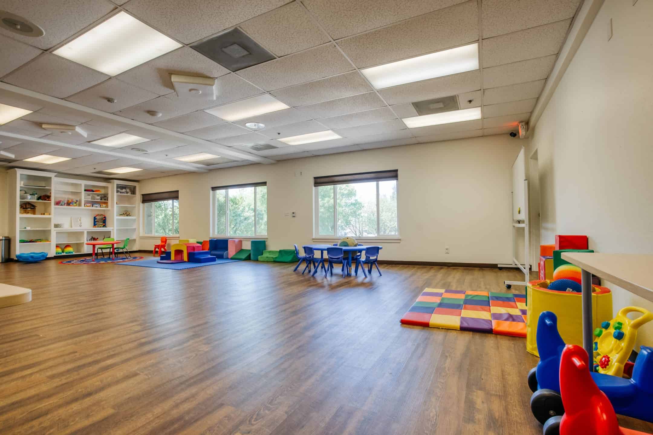 Bright, spacious classroom designed for early childhood education and behavioral development.